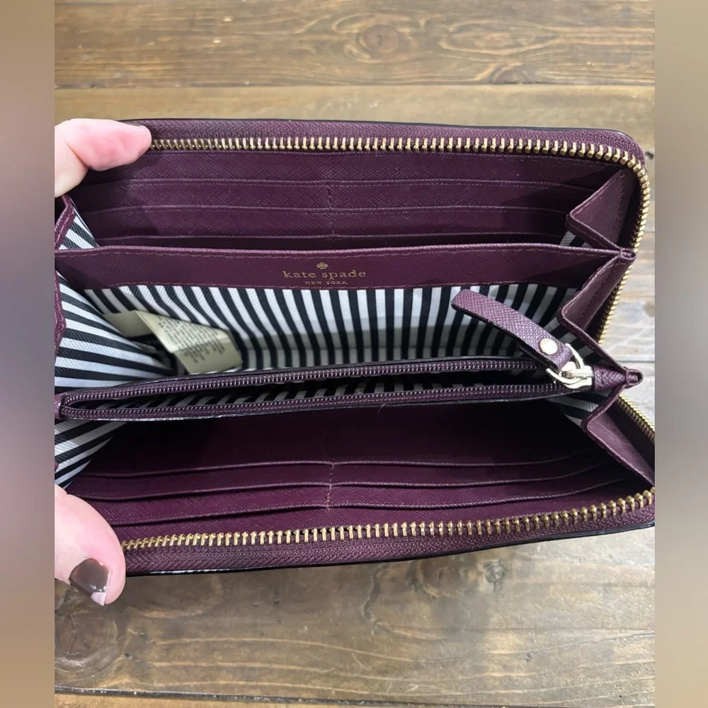 Kate Spade Cameron Street Perforated Rose Lacey Wallet in Deep Plum